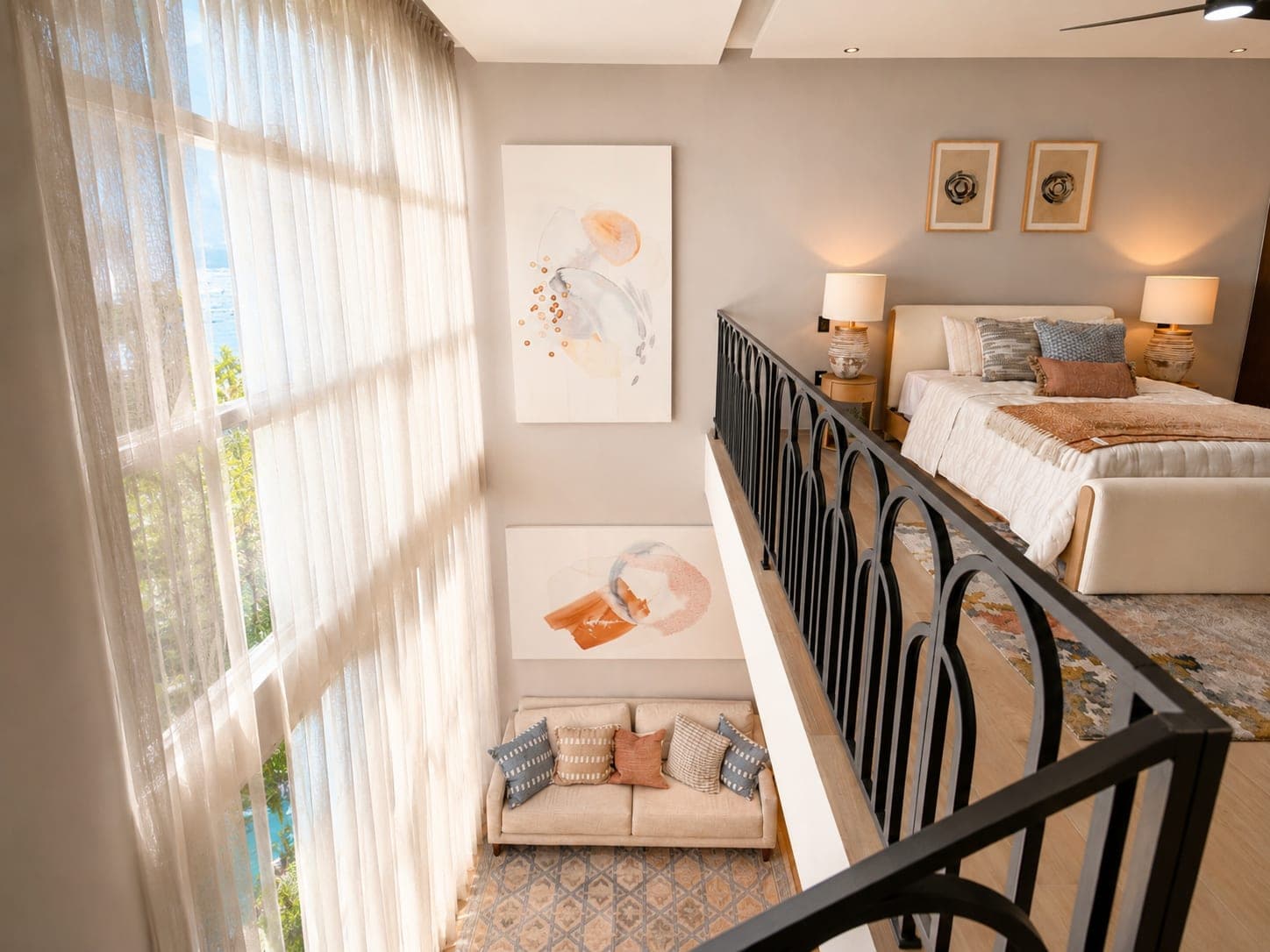 Upper bedroom of the Strómbus loft, seen over the railing